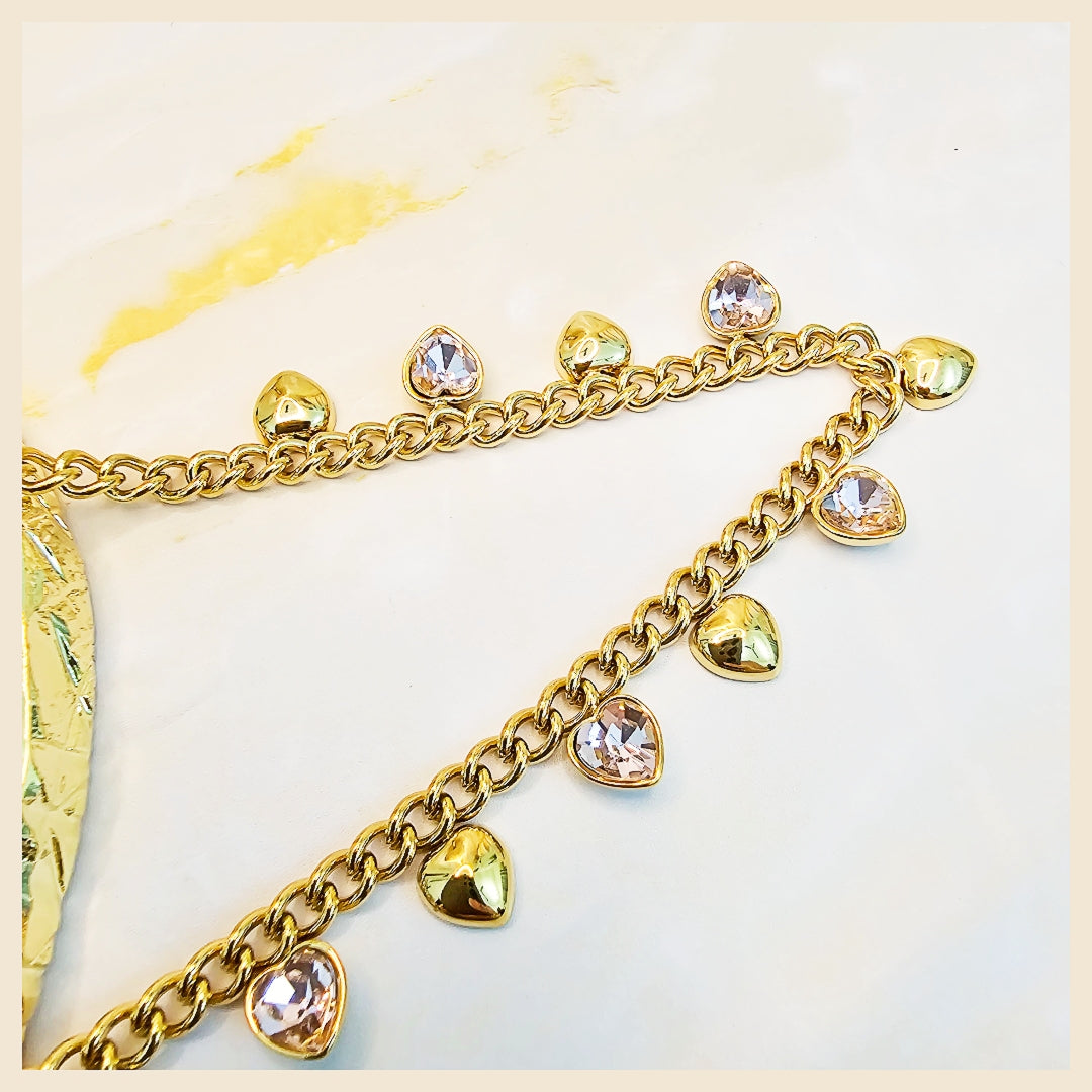 Dainty gold heart pendant necklace styled for modern women in Dubai, combining delicate craftsmanship with a romantic touch ideal for effortless daily elegance.