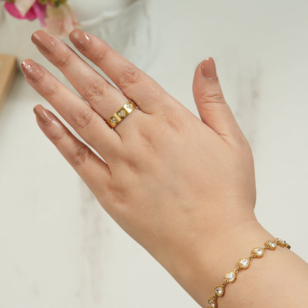 Sheela Clover heart-shaped engagement ring in 18K gold plated finish, designed for women in the UAE seeking timeless elegance and a meaningful symbol of love.