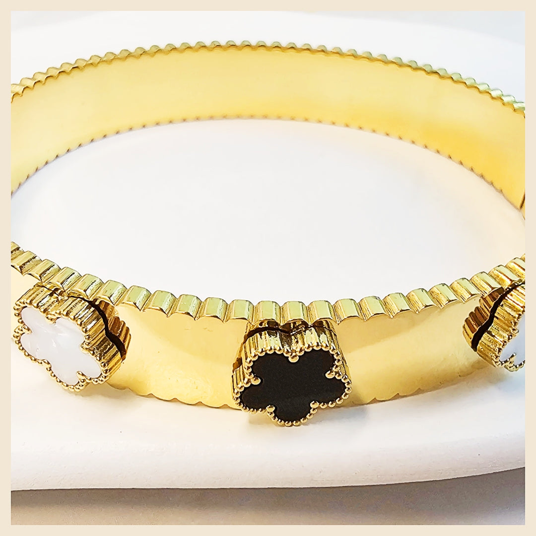 Sparkling crystal openable bracelet in 18K gold-plated finish, perfect for women in the UAE who love a bright, sophisticated wrist statement.