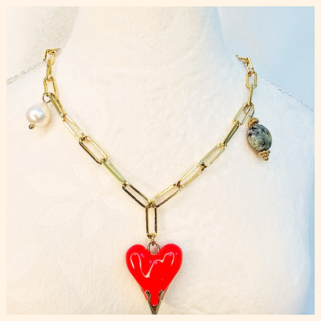 Statement Jaya gold-plated African stone necklace adding dramatic elegance and fashionable confidence, perfect for women who love unique luxury pieces.