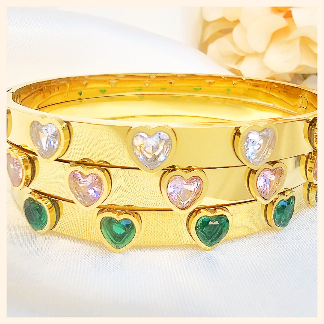 Refined open bangle with CZ accents, presented as an elegant gift choice for her, evoking trust, beauty, and a lasting impression in the UAE.