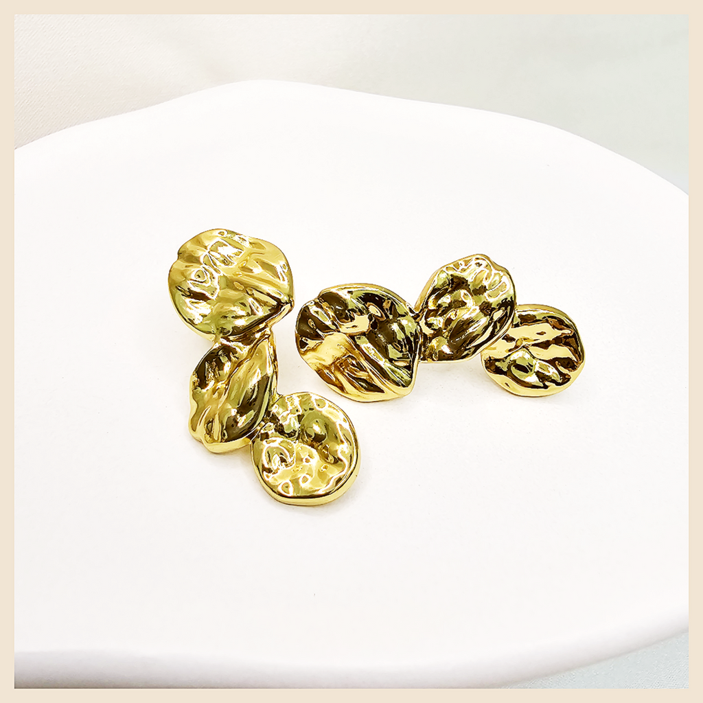 Textured heart statement dangle earrings by Asta, party-ready for women in the UAE who want bold elegance and a standout finishing touch.