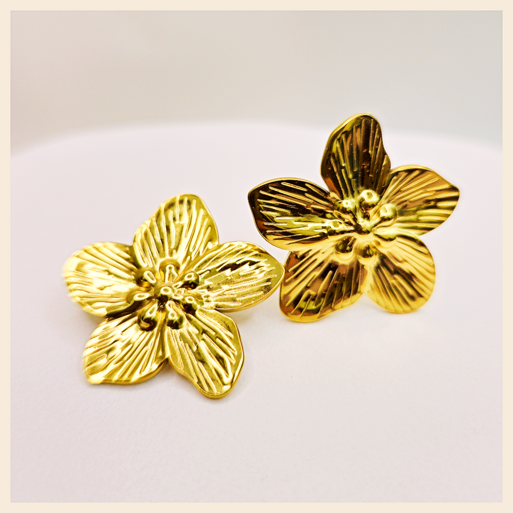 Trendy Beja floral statement earrings for women, styled for Dubai-inspired looks that blend modern glamour with soft romantic charm.