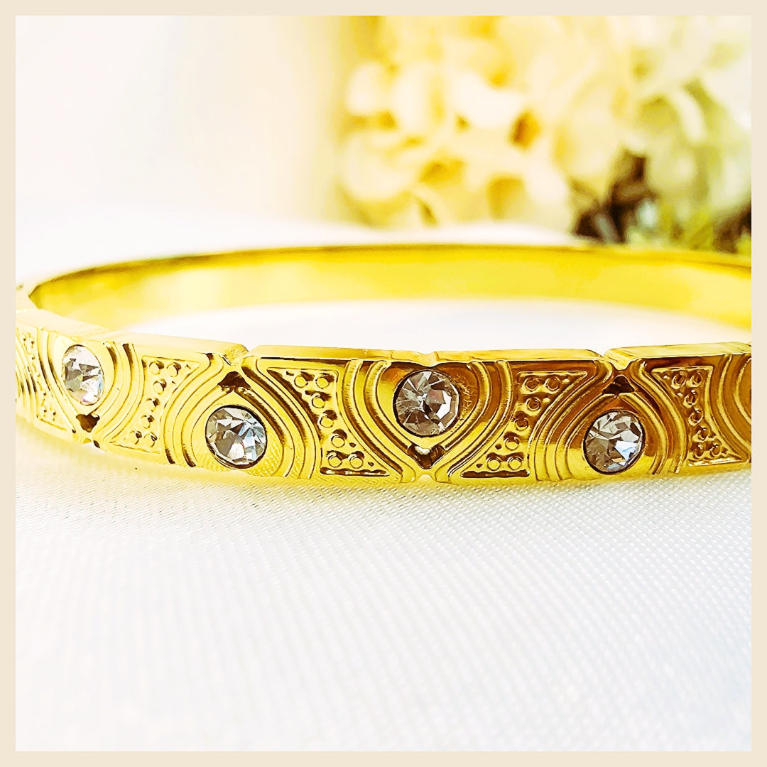 Trendy cloisonné gold bangles designed for daily luxury, offering comfort, durability, and a polished modern finish.