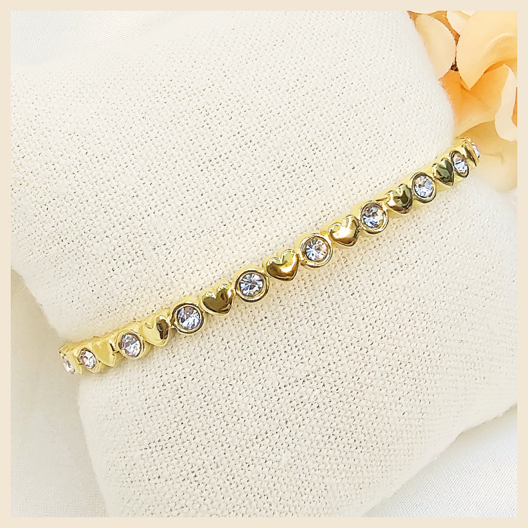 Vintage‑inspired large gold bracelet with rich texture, ideal for women who appreciate heritage charm paired with contemporary elegance.